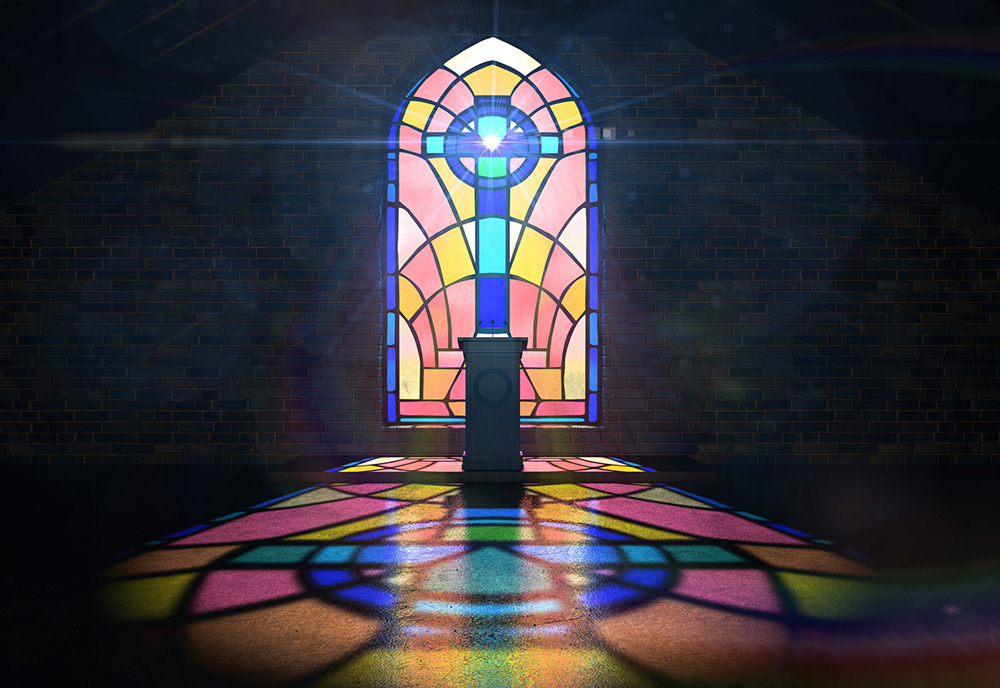 Pulpit in front of a stained glass window with a cross (Dreamstime/Albund)