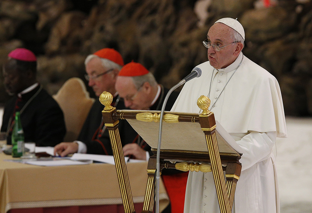 Pope Francis speaks at an event marking the 50th anniversary of the Synod of Bishops in Paul VI hall at the Vatican in this Oct. 17, 2015, file photo. The pope in his speech outlined his vision for how the entire church must be "synodal" with everyone listening to each other, learning from each other and taking responsibility for proclaiming the Gospel. (CNS/Paul Haring)