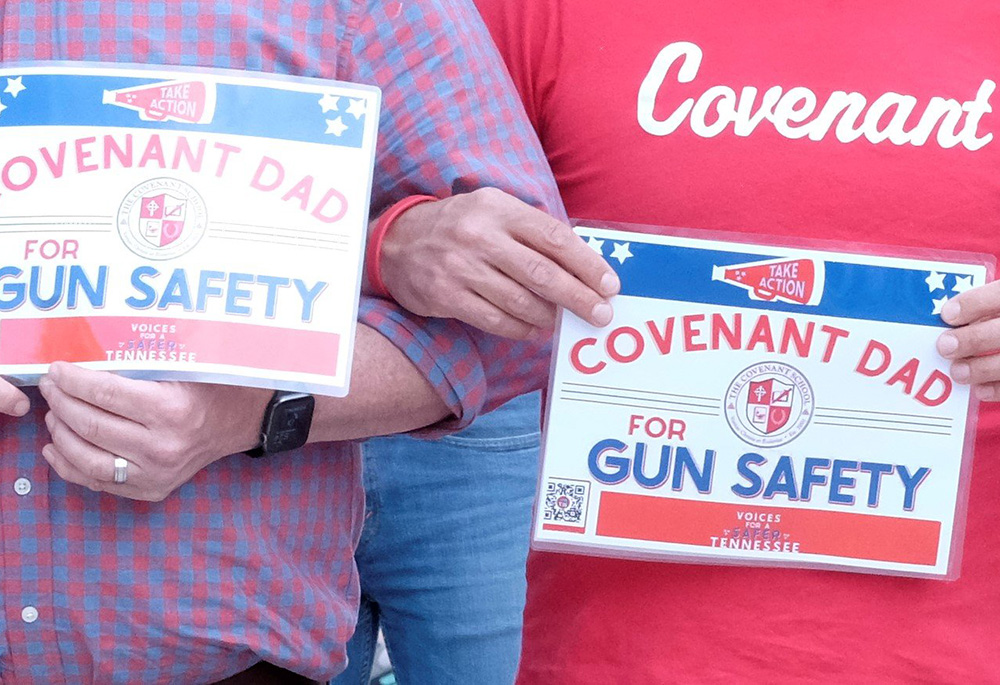 Participants hold signs calling for an end to gun violence outside the Tennessee Capitol in Nashville April 18, during a Voices for a Safer Tennessee event. The group organized a three-mile-long human chain that drew more than 8,000 people and ended at the capitol to urge the Legislature to take steps to address gun violence. (OSV News/Tennessee Register/Andy Telli)