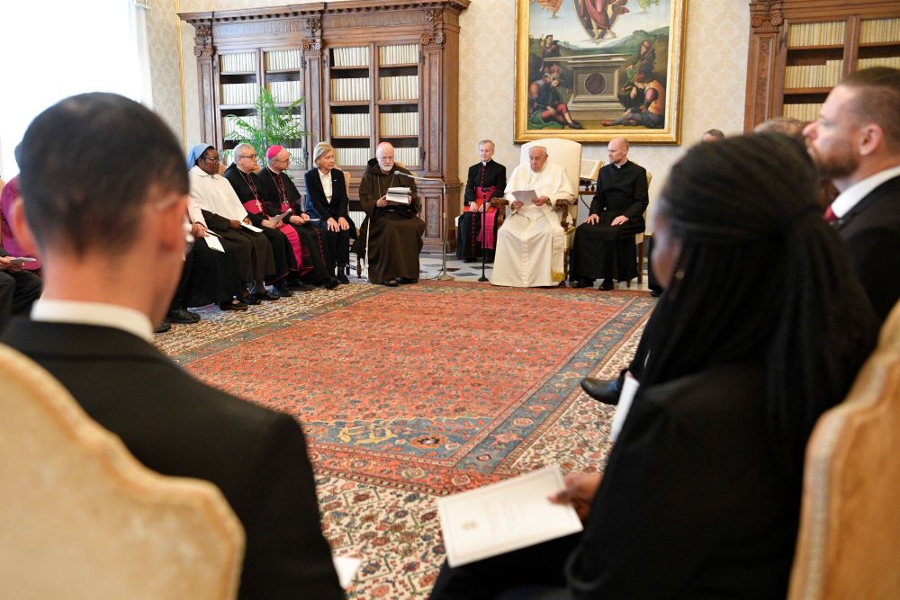 Cardinal Seán P. O'Malley of Boston, president of the Pontifical Commission for the Protection of Minors, speaks to Pope Francis during an audience with commission members at the Vatican May 5, 2023.