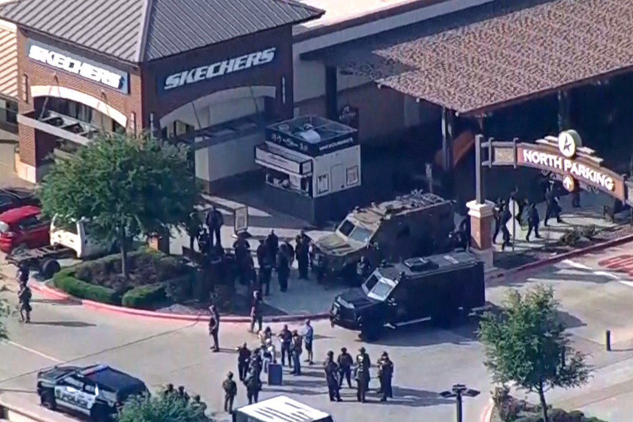 Police respond to a shooting in the Dallas area's Allen Premium Outlets May 6, 2023, in a still image from video. (OSV Newsphoto/ABC affiliate WFAA via Reuters)