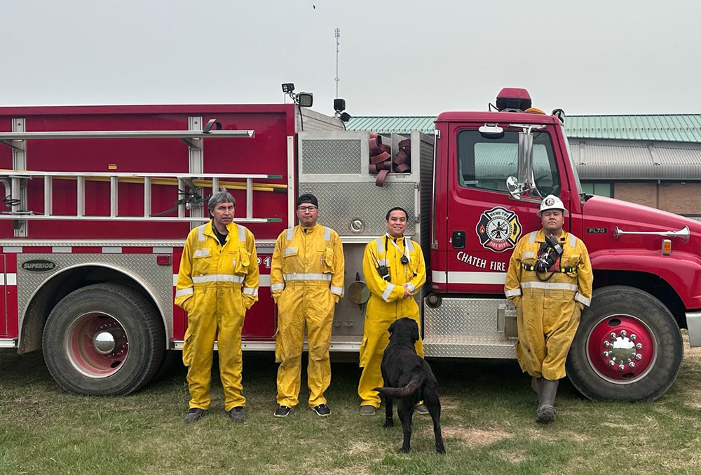 While Canada is fighting wildfires from western Alberta province to eastern Nova Scotia, Fr. Gerald Mendoza (third from left) is on the frontlines of the battle in firefighter uniform. (OSV News/Courtesy of Gerald Mendoza)