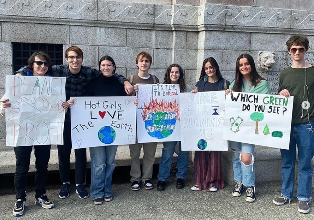 Photo from a #PeopleNotProfit protest, posted to the Climate Justice at Boston College Instagram account on March 26, 2022 (Courtesy of CJBC via @bcclimatejustice Instagram account)