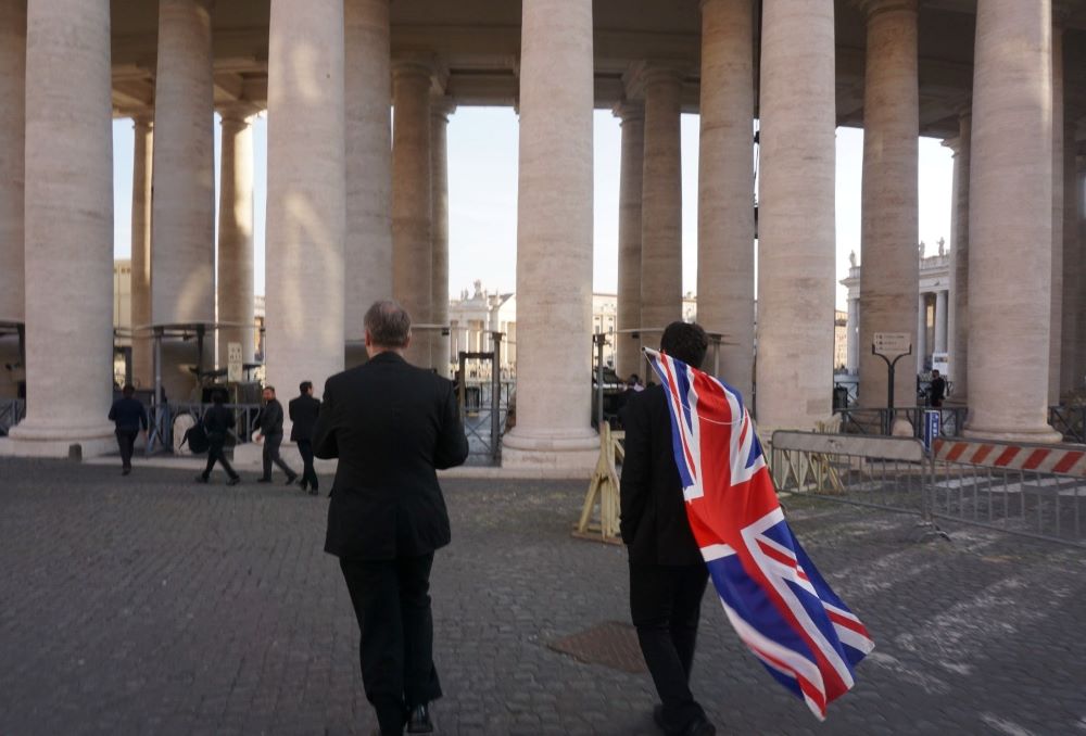 British seminarians carry a Union Jack flag as they approach St. Peter's Square. (Courtesy of Ryan Hawkes) 