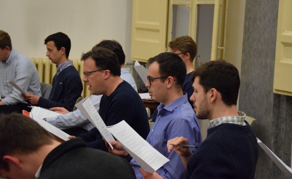 Members of the Venerable English College's schola rehearse. The group will perform music written for the coronation during events celebrating King Charles III's ascension to the throne. (Courtesy of Ryan Hawkes)