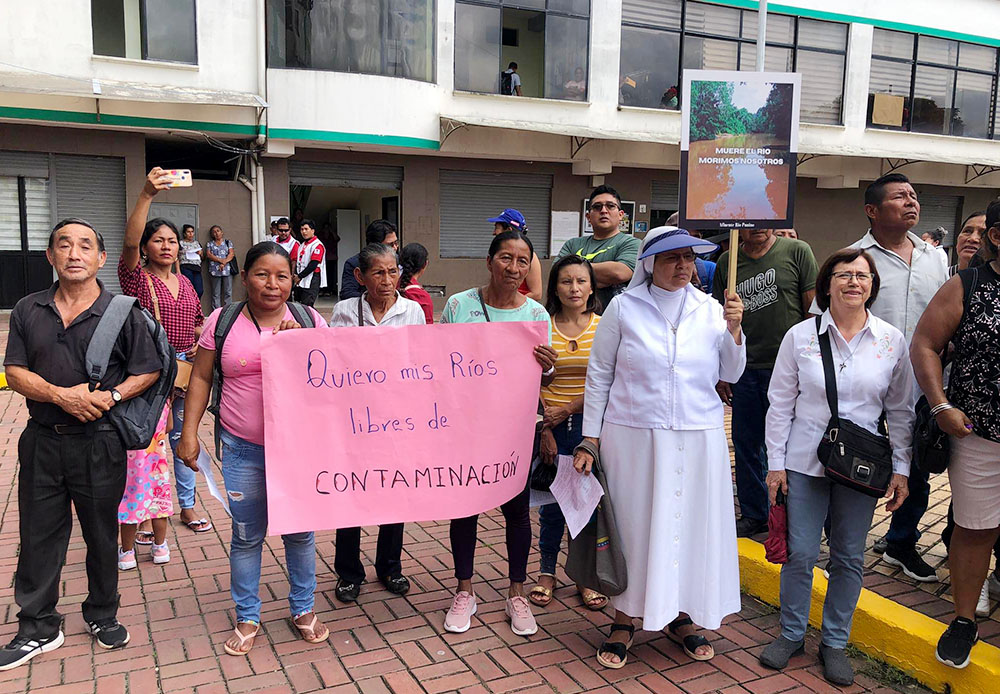 In March in Puerto Francisco de Orellana, Ecuador, activists protest mining and oil exploitation in the rainforest. (Courtesy of Aguarico Vicariate)