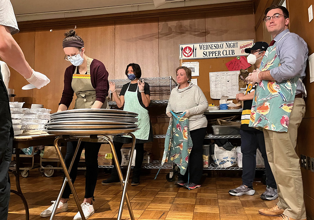 Volunteers at the Paulist Center's Wednesday Night Supper Club on March 1 in Boston (NCR photo/Bill Mitchell)