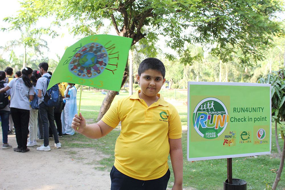 A boy in New Delhi takes part in a local Run4Unity event. (Aileen Tang)