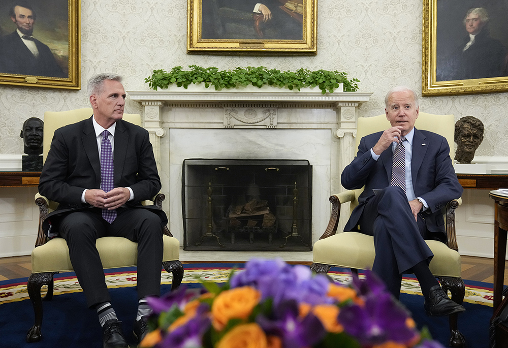 President Joe Biden meets with House Speaker Kevin McCarthy of California to discuss the debt limit in the Oval Office of the White House, May 22 in Washington. (AP photo/Alex Brandon)