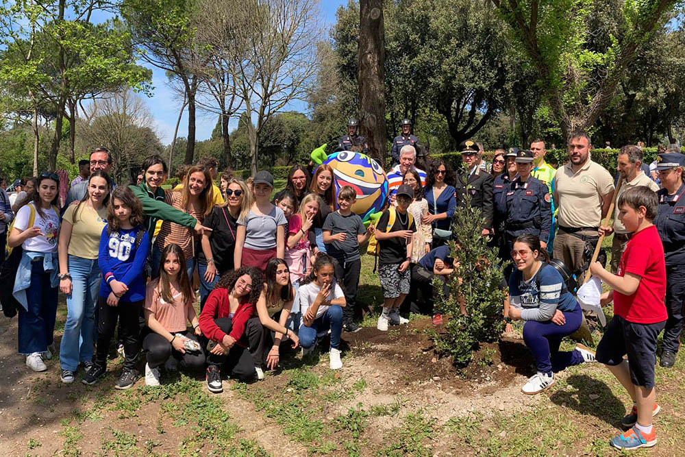 Members of Teens4Unity, the youth branch of the lay Catholic-led Focolare Movement, plant a holm oak tree in Rome on Earth Day (April 22) ahead of the Run4Unity on May 7, which this year carried a theme of "People, Planet and Our Ecological Conversion." (Courtesy of Focolare Movement)