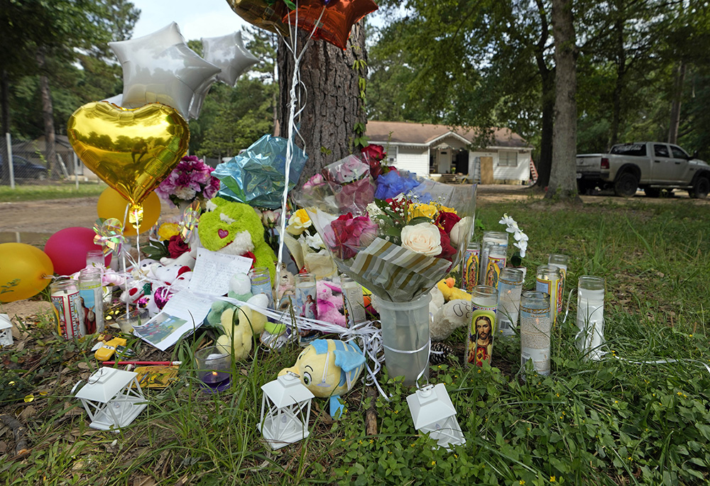A makeshift memorial is shown Tuesday, May 2, outside the home where a mass shooting occurred Friday, April 28, in Cleveland, Texas. Authorities say a man shot five of his neighbors, including a child, after they asked him to stop firing off rounds in his yard. The suspect was arrested May 2 after a four-day manhunt. (AP photo/David J. Phillip)