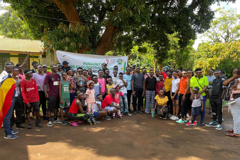 Teens and families from Uganda were among the thousands who participated in tree-planting efforts as part of the 2023 Run4Unity organized by Teens4Unity, the youth branch of the Focolare Movement, a lay Catholic movement. (Herve Nzeyimana)