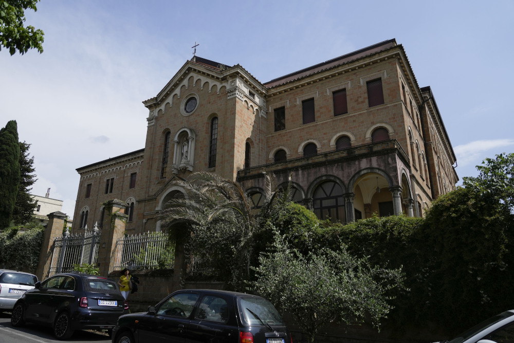 A view of a former monastery, in Rome, Monday, May 29, 2023, situated on a quiet residential street. It once sheltered Jews fleeing deportation in World War II. Purchased by the Vatican in 2021 as a dormitory for foreign nuns studying at Rome’s pontifical universities, the building now stands empty, a collateral victim of the latest financial scandal to hit the Holy See. (AP Photo/Alessandra Tarantino)