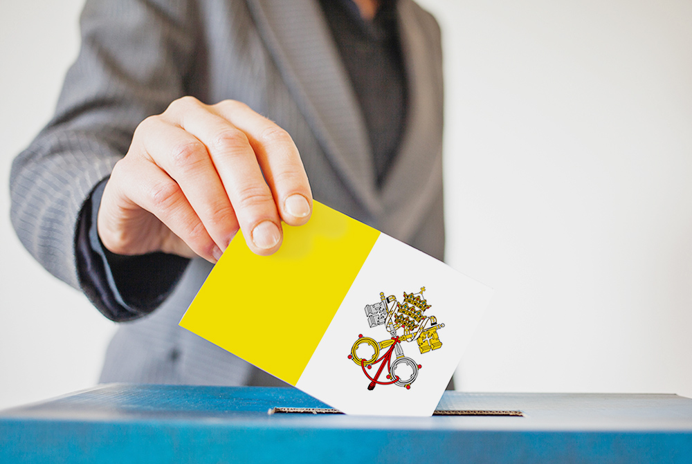 A woman casts a vote with a ballot decorated with the Vatican flag (NCR illustration/Toni-Ann Ortiz; photo by Dreamstime/Melinda Nagy)