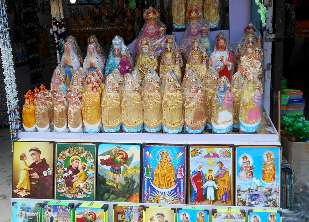 Statues of Our Lady of Velankanni predominate in a display of religious items in Chennai, India. (Dreamstime/Yahodkumar05)