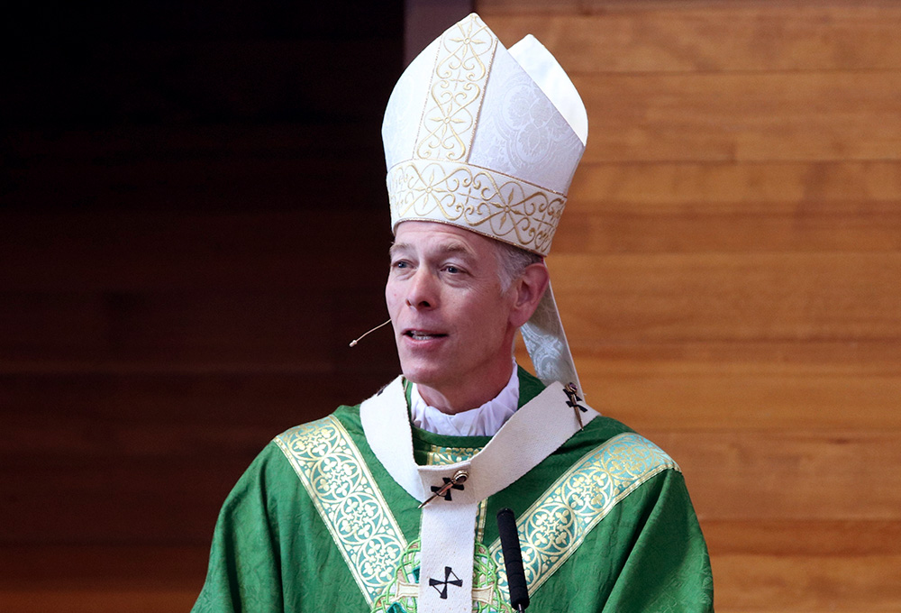 Archbishop Alexander Sample of Portland, Oregon, celebrates an August 2020 Mass at St. Mary Our Lady of Perpetual Help Parish in Albany, Oregon. (CNS/Catholic Sentinel/Ed Langlois)