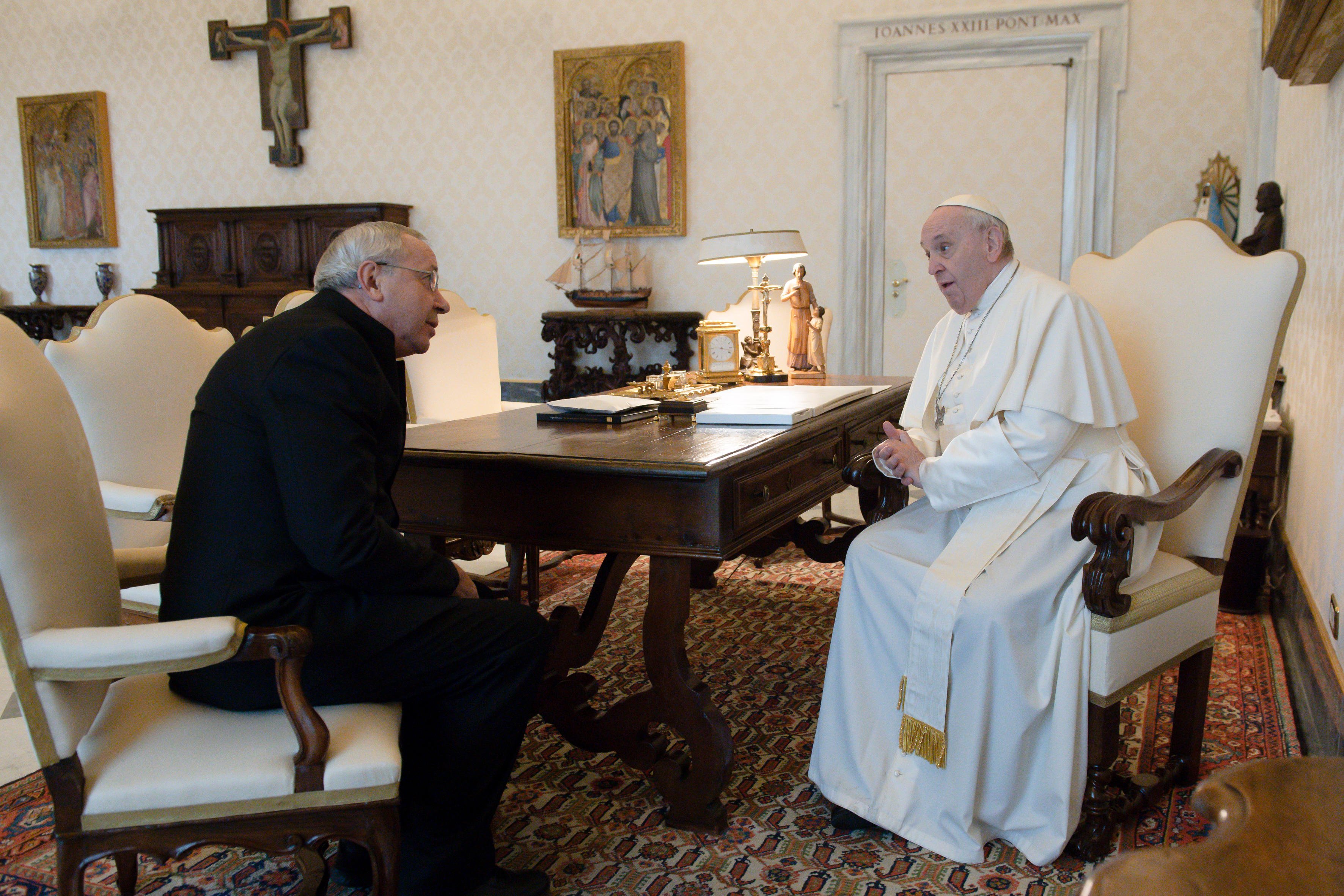 Pope Francis greets Jesuit Father Marko Rupnik during a private audience at the Vatican in this Jan. 3, 2022, file photo. Father Rupnik, whose mosaics decorate chapels in the Vatican, all over Europe, in the United States and Australia, is under restricted ministry after being accused of abusing adult nuns in Slovenia. (CNS photo/Vatican Media)