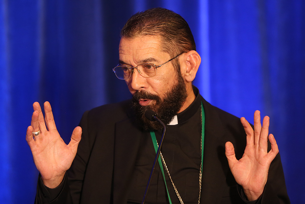 Bishop Daniel Flores of Brownsville, Texas, speaks June 15, 2023, during a news conference at the U.S. Conference of Catholic Bishops' spring plenary assembly in Orlando, Florida. Flores chairs the conference's Committee on Doctrine. (OSV News/Bob Roller)