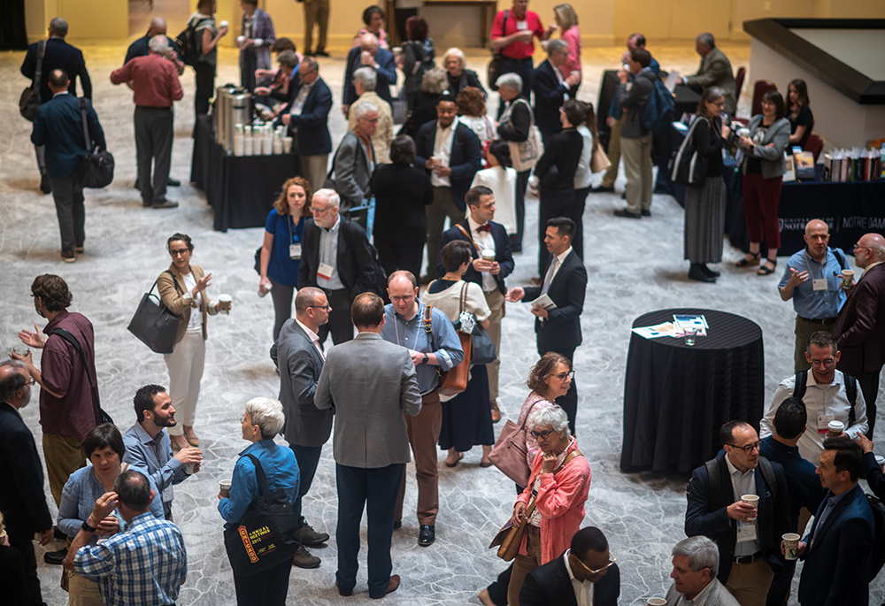 Members of the Catholic Theological Society of America mingle in the exhibit area during the June 8-11 convention in Milwaukee. (Courtesy of Catholic Theological Society of America/Paul Schutz)