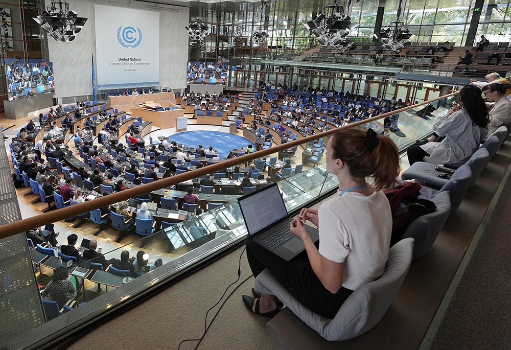 Participants meet at the U.N. climate change conference June 8 in Bonn, Germany. International climate talks at SB58 in Bonn were to prepare the COP28 climate summit in Dubai in December. (AP photo/Martin Meissner)