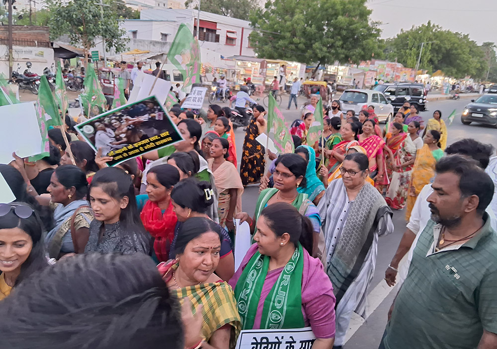 Presentation Sr. Dorothy Fernandes (center right, in gray, wearing dark-rimmed glasses) walks in a protest rally in Patna, Central India, on June 3 pledging support women wrestlers who are striking against workplace sexual harassment and expressing solidarity with the victims of Manipur violence. (Courtesy of Sr. Dorothy Fernandes)