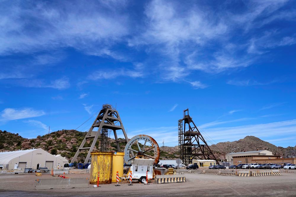 Mine shafts nine, right, and 10, left, tower over the Resolution Copper Mining Company facility, Friday, June 9, 2023, in Miami, Ariz. Resolution Copper Mining, a joint subsidiary of UK and Australian mining giants Rio Tinto and BHP, hopes to build one of the world's largest underground copper mines at Oak Flat outside Superior, about 70 miles (113 kilometers) east of Phoenix. (AP Photo/Matt York)