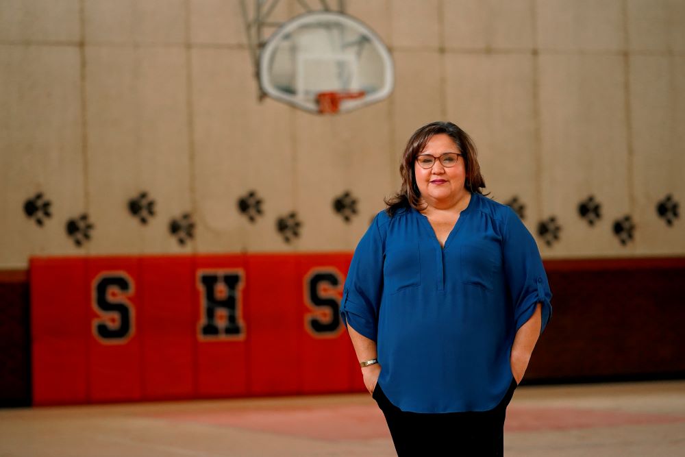 Superior Mayor Mila Besich stands in the gymnasium of the vacant Superior High School, Friday, June 9, 2023, in Superior, Ariz.