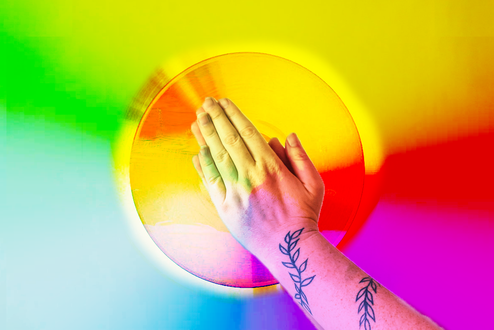 Praying hands in rainbow colors (Maxwell Kuzma)