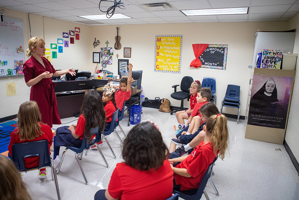 Megan Miller, a music teacher and orchestra director, teaches during an August 2019 class at St. Mary Catholic School in League City, Texas. (CNS/Texas Catholic Herald/James Ramos)