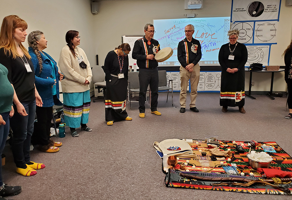 A group of people participate in a March Advancing Reconciliation workshop in Winnipeg, Manitoba, hosted by Returning to Spirit, a nonprofit organization. (Courtesy of Returning to Spirit)