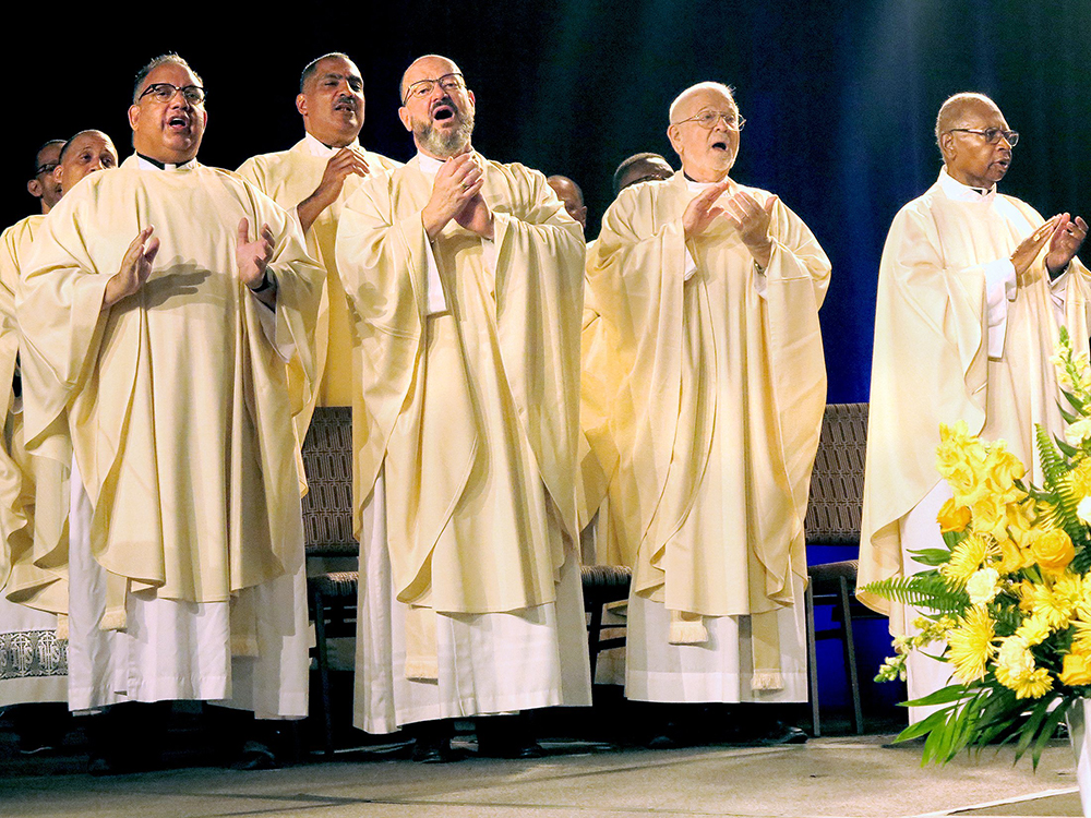Priests concelebrate the Mass for the Knights of Peter Claver and Ladies Auxiliary convention in New Orleans, July 16. For the first time in the historically Black Catholic fraternal organization’s history, the Knights of Peter Claver convened its six divisions at the same convention. (OSV News/Clarion Herald/Christine Bordelon)