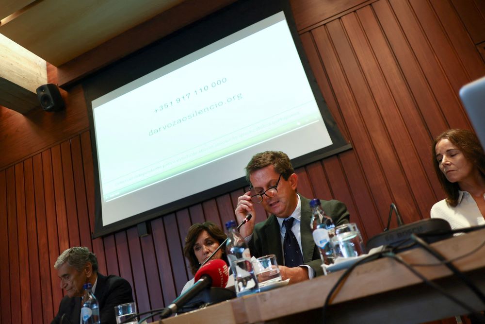 Pedro Strecht, a psychiatrist who heads Portugal's Independent Committee for the Study of Child Abuse in the Catholic Church, attends a news conference in Lisbon Oct. 11, 2022.