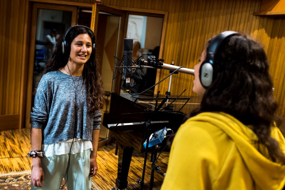 Young people record the official theme song for the Lisbon 2023 World Youth Day in Torres Vedras, Portugal, in this Aug. 5, 2020, file photo. The official song is titled "Ha Pressa no Ar" (There Is Urgency in the Air). World Youth Day had been postponed because of the coronavirus pandemic. (CNS/World Youth Day Lisbon, Filipe Amorim)
