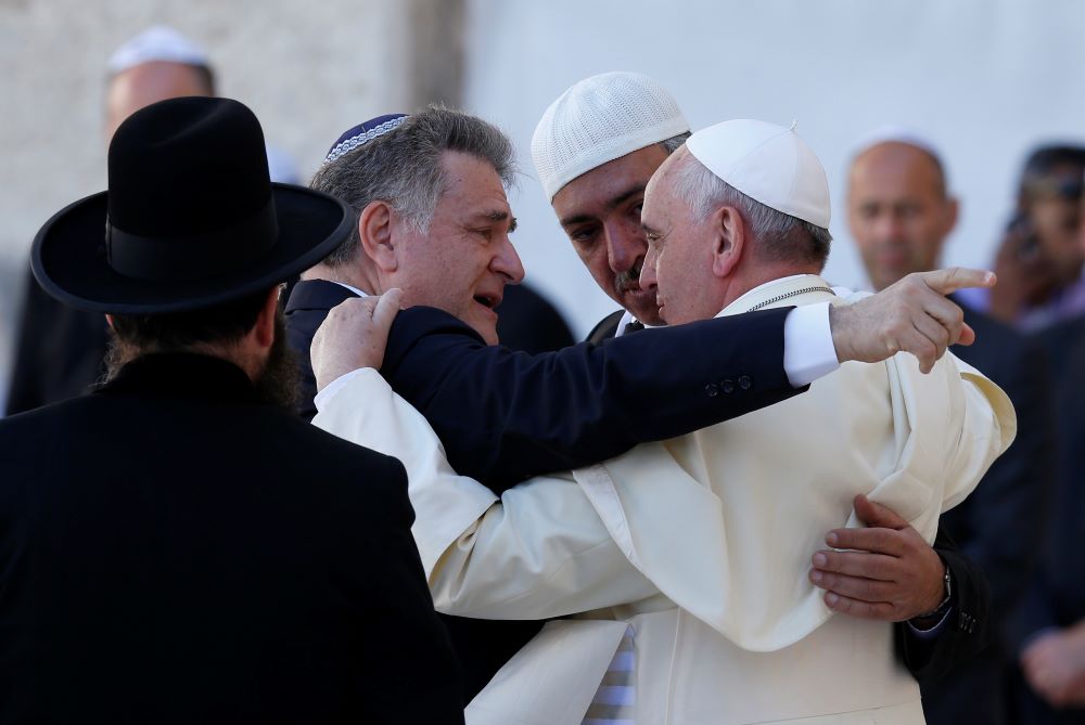 Pope Francis walks with Argentine Rabbi Abraham Skorka after praying at the Western Wall in Jerusalem in this May 26, 2014, file photo. (CNS/Paul Haring)