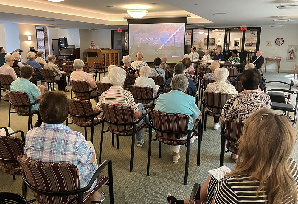 IHM Sr. Barbara Stanbridge addresses an audience of about 45 religious women and local community members at "We Can't Breathe," held July 25 at the IHM motherhouse in Monroe, Michigan. (Amy Ketner) 