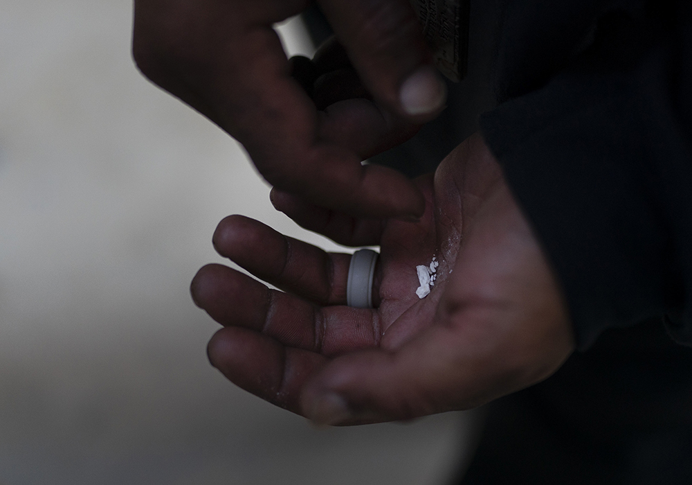 A homeless person holds pieces of fentanyl Aug. 18, 2022, in Los Angeles. Last year saw an overall increase in drug overdose deaths in the U.S. In New Jersey there have been more than 3,000 fatalities annually due to drug overdoses. (AP photo/Jae C. Hong)