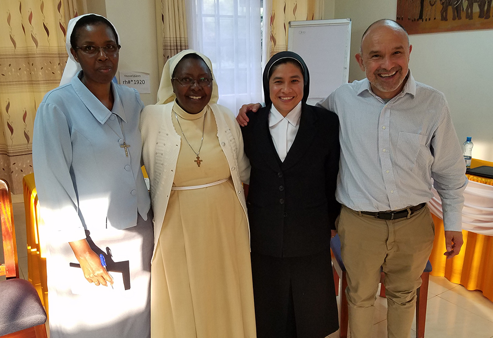 The Center for Applied Research in the Apostolate and the International Union of Superiors General facilitate a monthly exchange of data for elder care. Key participants include, from left: Sr. Candida Mukundi of the Assumption Sisters of Nairobi; Sr. Bibiana Ngundo of the Little Sisters of St. Francis; Brenda Hernandez of the Daughters of Immaculate Mary of Guadalupe; and Fr. Luis Falcó of the Missionaries of the Holy Spirit. (Courtesy of Center for Applied Research in the Apostolate)