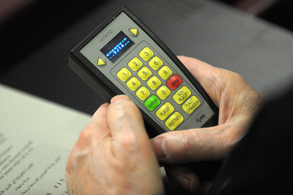 An electronic voting device is used by a participant during the Synod of Bishops for the Middle East at the Vatican in 2010. (CNS/Catholic Press Photo/Alessia Giuliani)