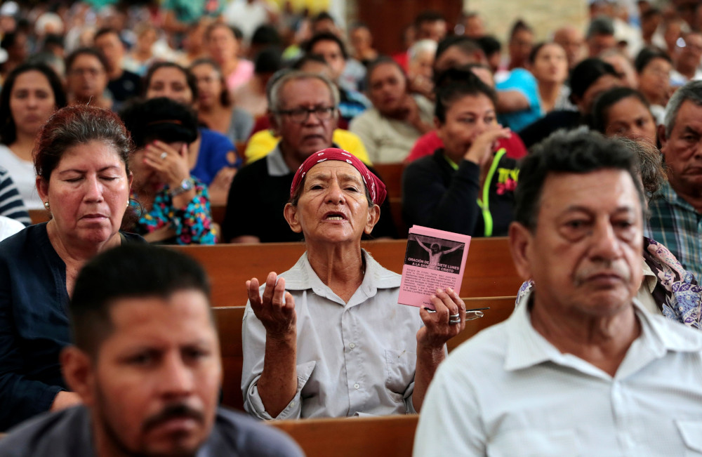 A woman prays during a Mass at the Metropolitan Cathedral in Managua, Nicaragua, Nov. 21, 2019. (OSV News photo/Oswaldo Rivas, Reuters)