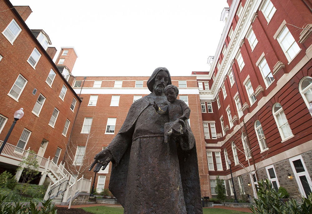 Isaac Hawkins Hall, on the campus of Georgetown University, is seen in this file photo from April 4, 2017. Previously known as Mulledy Hall and later Freedom Hall, it was renamed in 2017 for one of the 272 enslaved men, women and children sold to plantation owners by Georgetown's Jesuit community in order to finance the school. Hawkins was the first enslaved person listed in the sale documents. (OSV News/Tyler Orsburn, CNS)