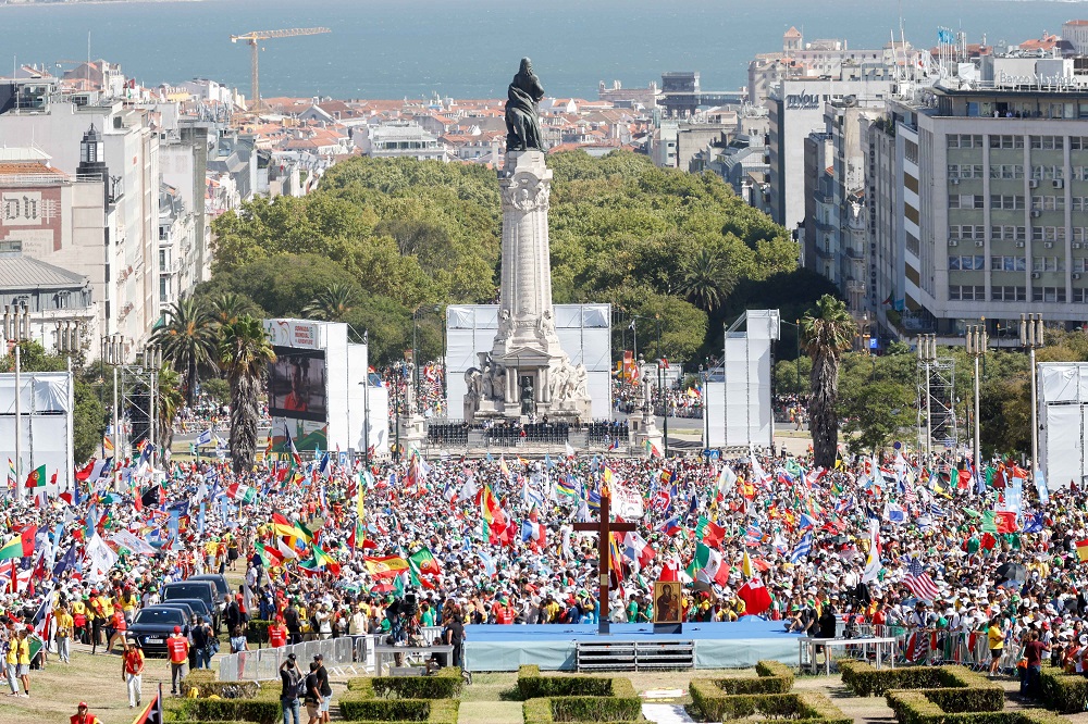 Tens of thousands of young people attend the World Youth Day welcome ceremony at Eduardo VII Park in Lisbon, Portugal, Aug. 3, 2023.