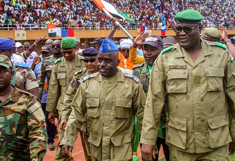 Members of a military council that staged a coup in Niger attend a rally Aug. 6 at a stadium in Niamey, Niger. (OSV News/Reuters/Mahamadou Hamidou)