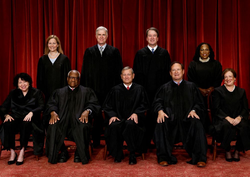 U.S. Supreme Court justices pose for their group portrait at the Supreme Court in Washington Oct. 7, 2022. Seated from left are Justices Sonia Sotomayor and Clarence Thomas, Chief Justice of the United States John G. Roberts Jr., and Justices Samuel A. Alito Jr. and Elena Kagan. Standing from left are Justices Amy Coney Barrett, Neil M. Gorsuch, Brett M. Kavanaugh and Ketanji Brown Jackson. (OSV/Reuters/Evelyn Hockstein)