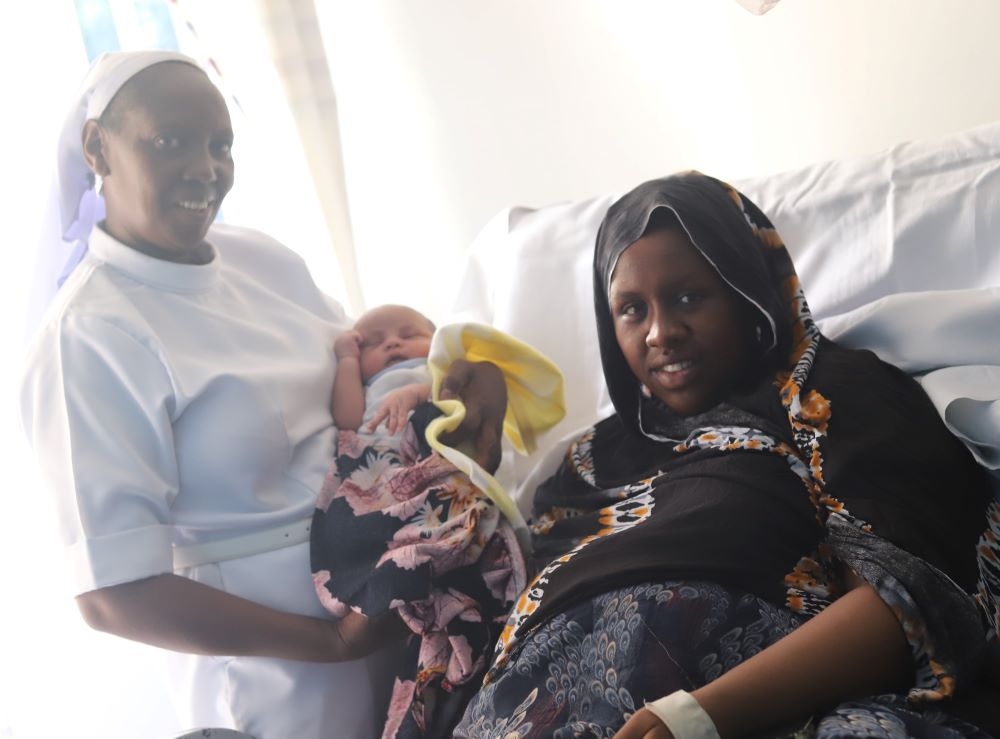 Sabrin Liban, a refugee from Somalia, lies on her hospital bed at the Kakuma Mission Hospital. Liban said she is grateful to the sisters for helping her deliver her son via Caesarean section.