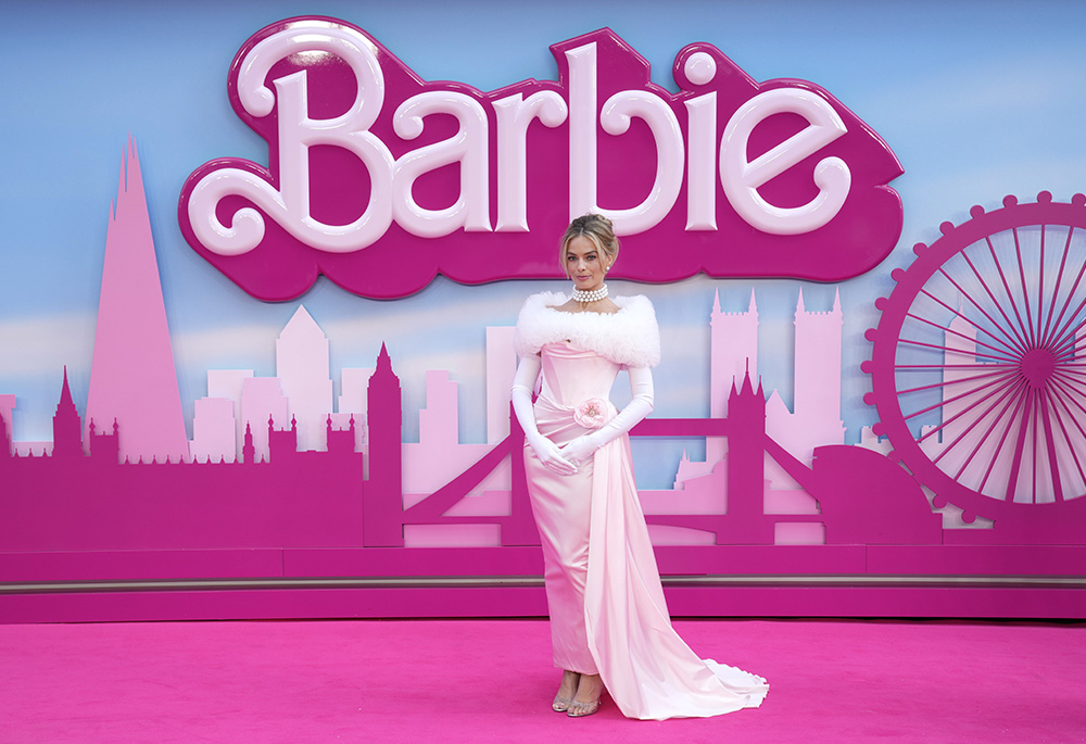 Margot Robbie poses for photographers upon arrival at the premiere of the film "Barbie" in London July 12. (AP/Invision/Scott Garfitt)