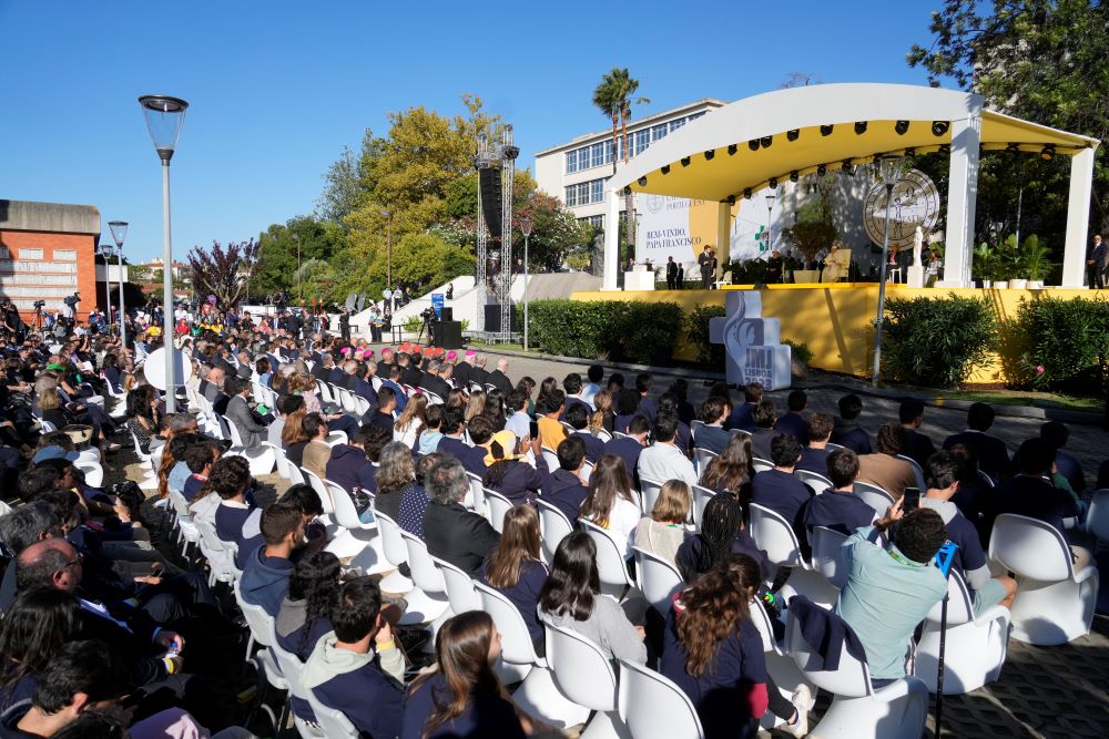 Pope Francis attends a meeting with the students of the Portuguese Catholic University in Lisbon, Thursday, Aug. 3, 2023. (AP/Gregorio Borgia)