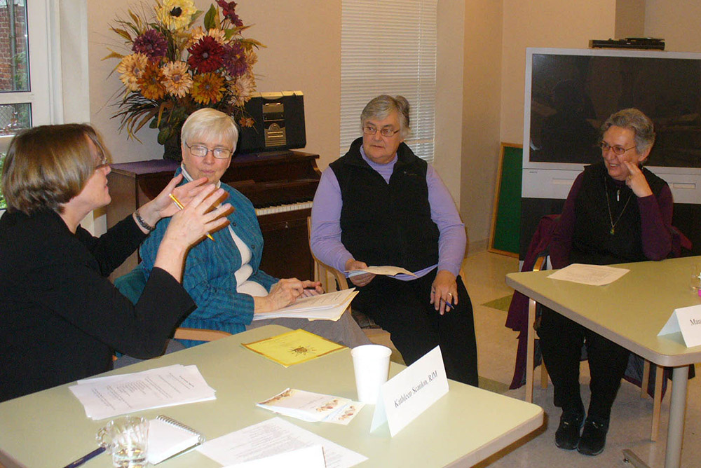 Board members from UNANIMA International engage in a workshop led by then-coordinator Holy Names of Jesus and Mary Sr. Catherine Ferguson in 2010. (Catherine Ferguson)