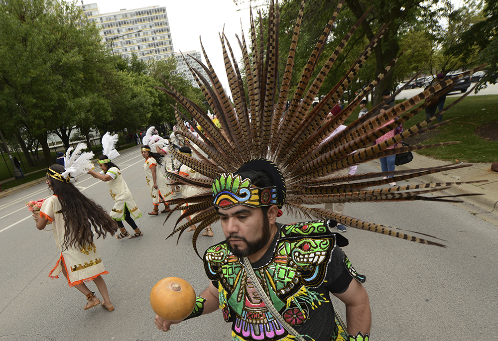 Members of the Cristo Rey Parish perform during the Parade of Faiths for the Parliament of the World's Religions, Aug. 13 in Chicago. (AP photo/Paul Beaty)