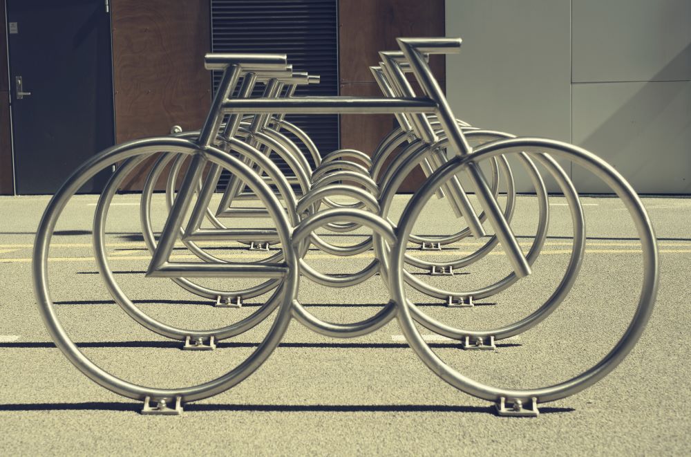 modern looking bike rack (Unsplash/Fredrik Solli Wandem)
