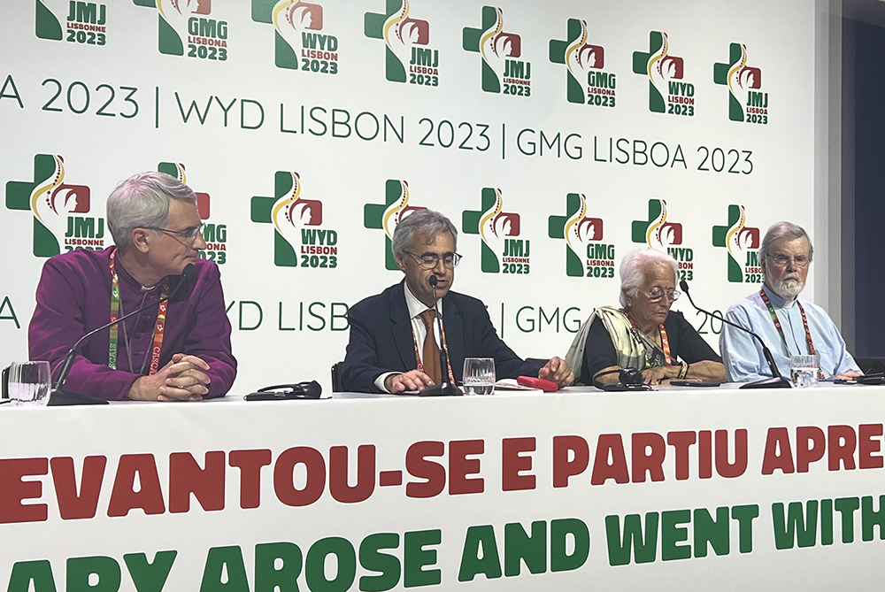 Participants in an interfaith meeting with Pope Francis in Lisbon, Portugal, hold a press conference Aug. 4. From left: Bishop Jorge Pina Cabral of the Anglican Church of Portugal; Timóteo Cavaco, president of the Evangelical Alliance of Portugal; Suryakala Chhanganlal, who represented the Portuguese Hindu community; and Fr. Peter Stilwell, who heads the Patriarchate of Lisbon's Department of Ecumenical Relations and Interreligious Dialogue. (NCR photo/Brian Fraga)